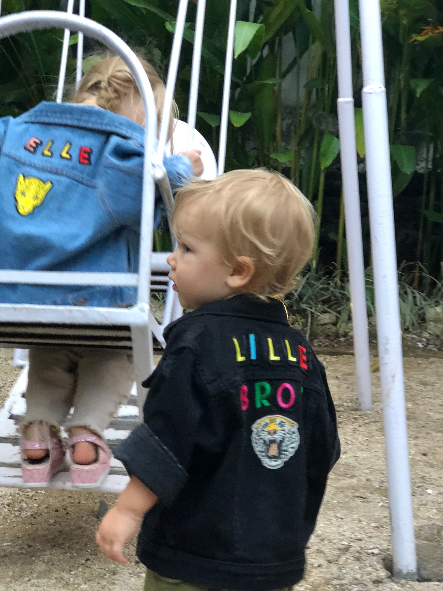 Elle and Lille, Matilda Gyllenhammar’s children, wearing personalised Patchy Tiger denim at the swings