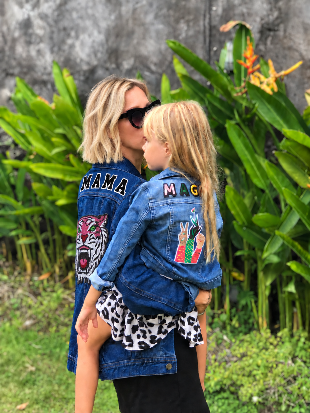 Matilda Gyllenhammar holding her daughter in matching Patchy Tiger denim